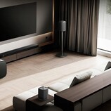 LG pairs its new soundbar with wireless speakers for a more immersive surround sound (Image source: LG)