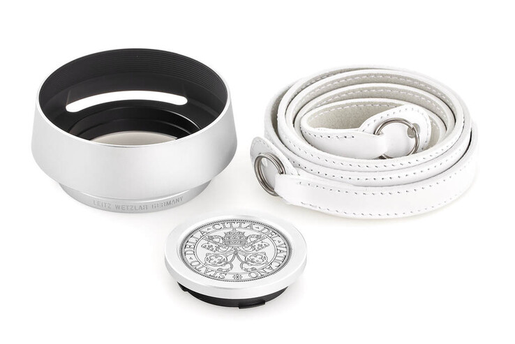 A lens hood, camera strap, and engraved lens cap comes with the Leica 'Pope Francis' M-A kit. (Image source: Leica)