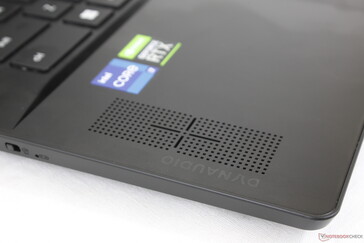 The grilles on the palm rests remain while the grilles above the top row of keyboard keys are now gone