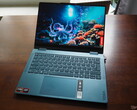 The image portrays the Yoga 7 two-in-one laptop from Lenovo in its typical laptop position