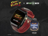 Street Fighter II: My Play Watch gaming watch with a red strap, gold-finished details and a second watch display, against a dark textured background.