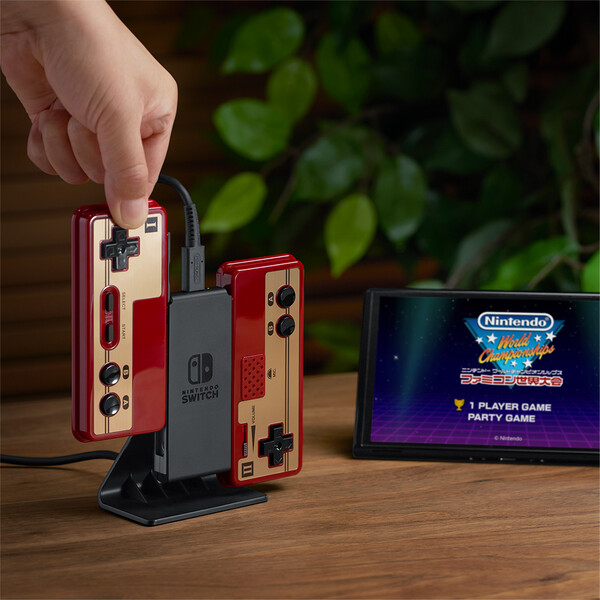 The Joy-Con Charging Stand can also charge NES controllers. (Image source: Nintendo)