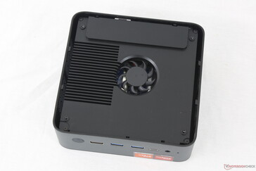 Removing the bottom plate reveals the fan and cooling apparatus. A second fan sits on the other side of the motherboard