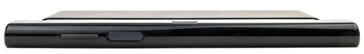 Right edge (opened): volume control, power button/fingerprint sensor