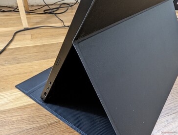 Case attaches magnetically to the top half of the back of the monitor
