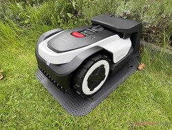 The Roborock RockNeo Q105 in its charging station.