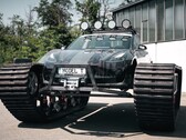 After being equipped with chains weighing 1.3 metric tons each, the Tesla Model 3 is hardly recognizable (Image: The Real Life Guys)