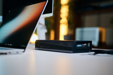 Laid flat on the desk, the low-profile enclosure offers quick front access to USB-A and USB-C expansion ports alongside its subtle RGB status lighting.