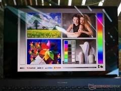 Outdoors under shade. Glare is unavoidable from the glossy overlay