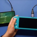 A modded Nintendo Switch Lite outputs gameplay over HDMI to an external display (Image source: Taki II via YouTube)