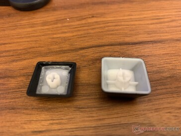 GK82 keycap (left) vs. Corsair keycap (right). The low-profile KG82 keycaps are much smaller
