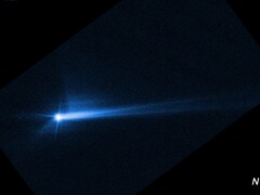 Image showing the debris blasted from the surface of Dimorpho after intentional impact by NASA’s DART spacecraft (Image source: NASA, ESA, STScI, and Hubble; cropped)