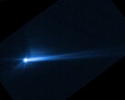 Image showing the debris blasted from the surface of Dimorpho after intentional impact by NASA’s DART spacecraft (Image source: NASA, ESA, STScI, and Hubble; cropped)