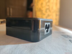 The 65 W power adapter is quite compact and can sufficiently power the laptop under full load