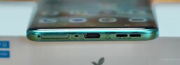 Bottom: SIM slot, microphone, USB-C port, speaker