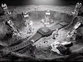 Casio x GRAGG LW-204GRAGG-1BDF digital watch displayed on a sculptural silver stand surrounded by miniature astronauts and molten-metal-inspired objects.
