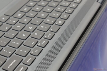 The grilles along the top of the keyboard are for additional ventilation and not audio