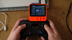 Gaming on Rabbit R1 isn&#039;t that bad if you have a wireless controller and don&#039;t mind the tiny screen (image source: Bringus Studios)