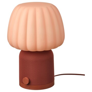 The Kulglass Bluetooth speaker lamp in red-brown with pink. (Image source: IKEA)