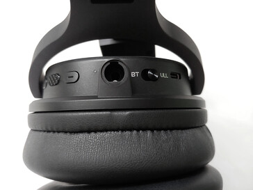 Large control buttons, USB-C port, and 3.5 mm (1/8”) audio jack on the right earcup.