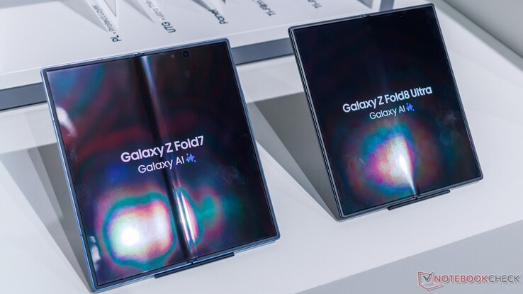 The crease on the Galaxy Z Fold7 (presumably from use) compared to a new Galaxy Z Fold8 Ultra.