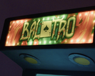 Balatro logo on an arcade machine