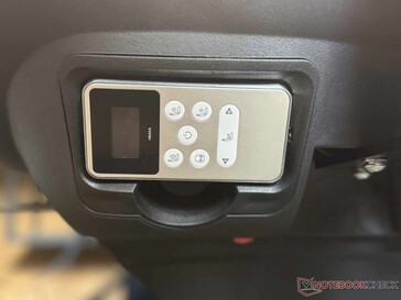 ...is stored in the side of the seat when not in use, connected by a cable.