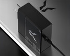The Bellator 245W laptop charger has a round 5525 DC plug. Pictured: the power adapter on top of a laptop.