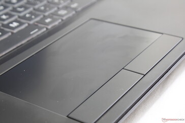 Center of trackpad doubles as a fingerprint reader. Its ultra-smooth surface, however, is very different from most other laptops