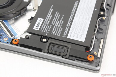 Down-firing stereo speakers near front corners