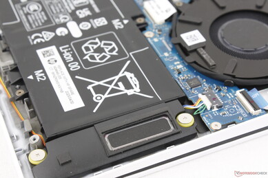 Down-firing stereo speakers near front corners exhibit no rattling even at high volume settings