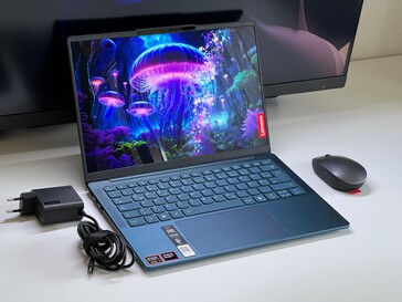 Both the Yoga Slim 7 14 and...
