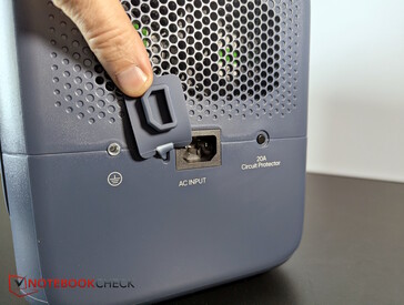 The AC charging port is located on the right, along with the dual cooling fans.