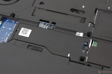 The primary M.2 2280 slot is accessible after removing the bottom panel and its aluminum cover