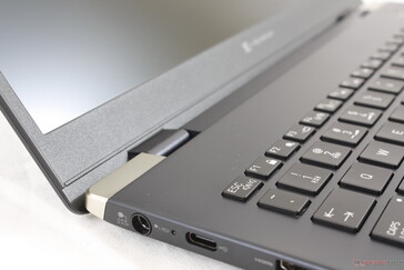 Hinges are firm with minimal teetering when typing since the lid is so light