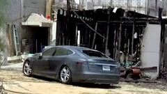 The burning Tesla was wired illegally to the powerline (Image source: Nas)