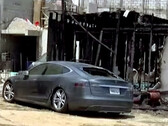 The burning Tesla was wired illegally to the powerline (Image source: Nas)
