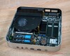 Minisforum AI X1 Pro with the uninstalled PSU and speakers