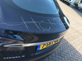 A defaced Tesla Model S. Elon Musk proposes Tesla cars can raise the alarm to prevent keying (Image source: John Vermetten via Autogespot)