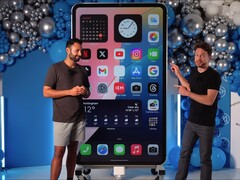 YouTubers DIY Perks and MrWhoseTheBoss have built the world's largest iPhone 15 Pro Max. (Image source: YouTube / MrWhoseTheBoss)
