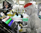 A Samsung display technician working on OLED display equipment. (Image: Samsung)