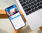 A phone with the Facebook app displayed on the screen. Stock image. (Image source: Timothy Hales Bennett on Unsplash)