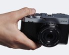 Fujifilm X-E4 compact APS-C camera in hand