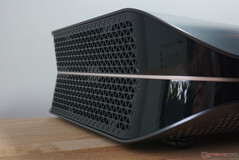 There are large ventilation grilles on the left and right for the powerful light source. There is also a USB port on the right.