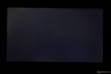 light-moderate uneven backlight bleeding along the top left corner