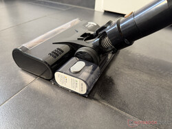 The water tank and mop pad hook onto the rear of the floor head.