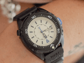 The Timex Intrepid x Dimepiece Blackout Edition features a black stainless steel case, cream dial and purple accents