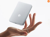 The 10,000mAh UltraThin Magnetic Power Bank costs around $51 in China. Pictured: a promo picture showcasing its thin and light design.