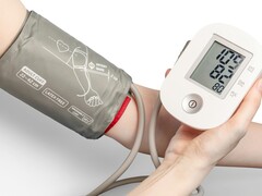 A person using a medical tonometer (Image source: Mockup Graphics via Unsplash; cropped)