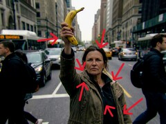 Woman holding a banana: What clues to look for